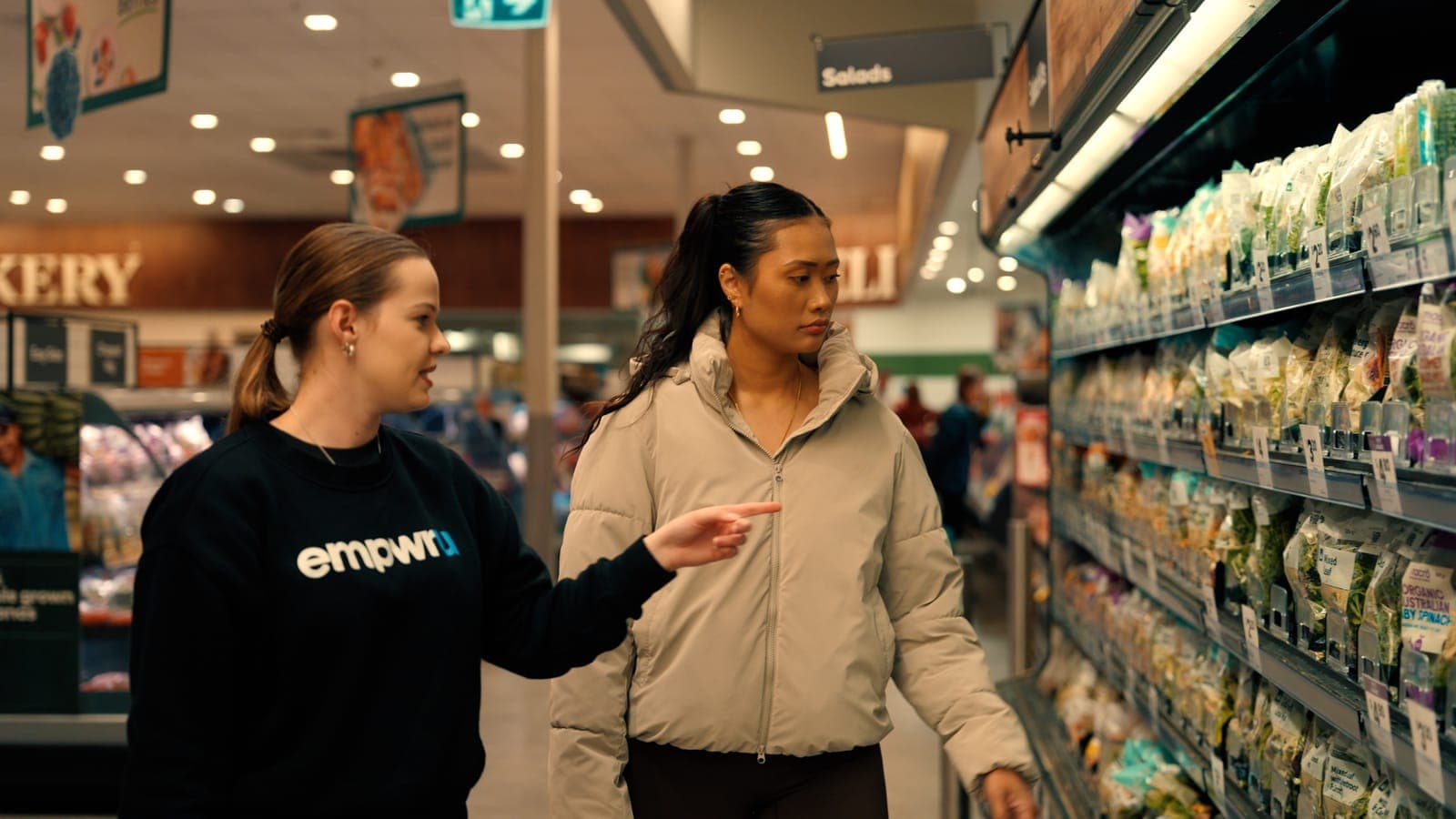 A participant doing the grocery shopping with her EmpwrU support worker